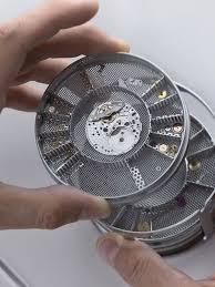 Watch parts a placed in a machine